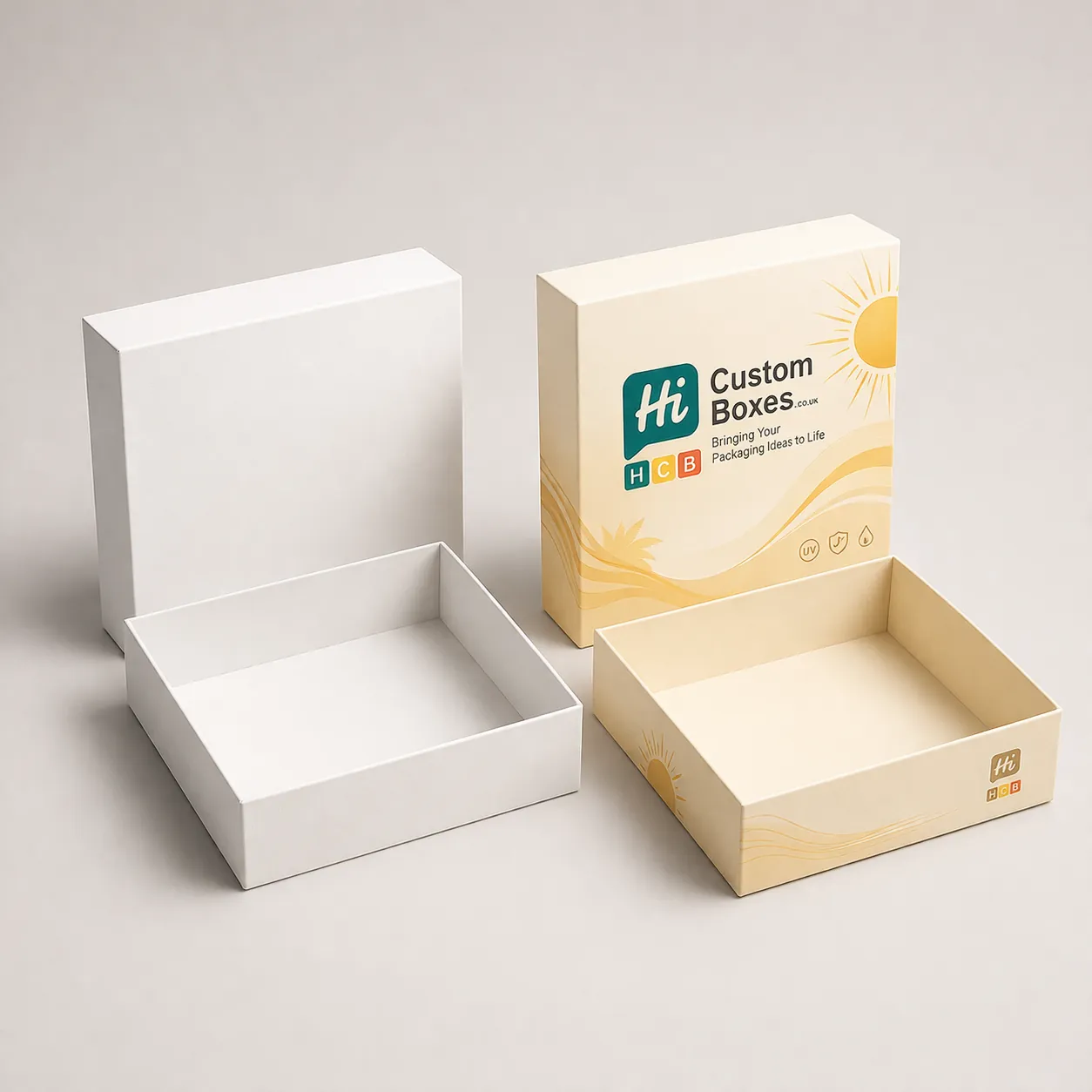 Two square two-piece rigid boxes, one plain white and one with custom yellow sun illustrations. class=